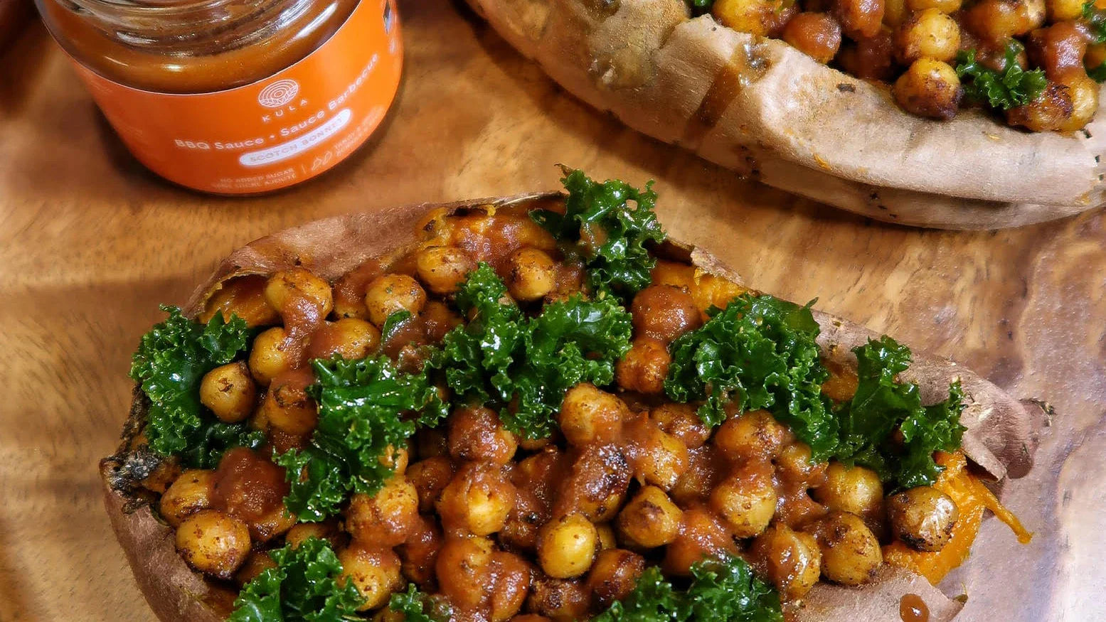 Jerk Chickpea Stuffed Sweet Potatoes with Kula’s Scotch Bonnet Sauce